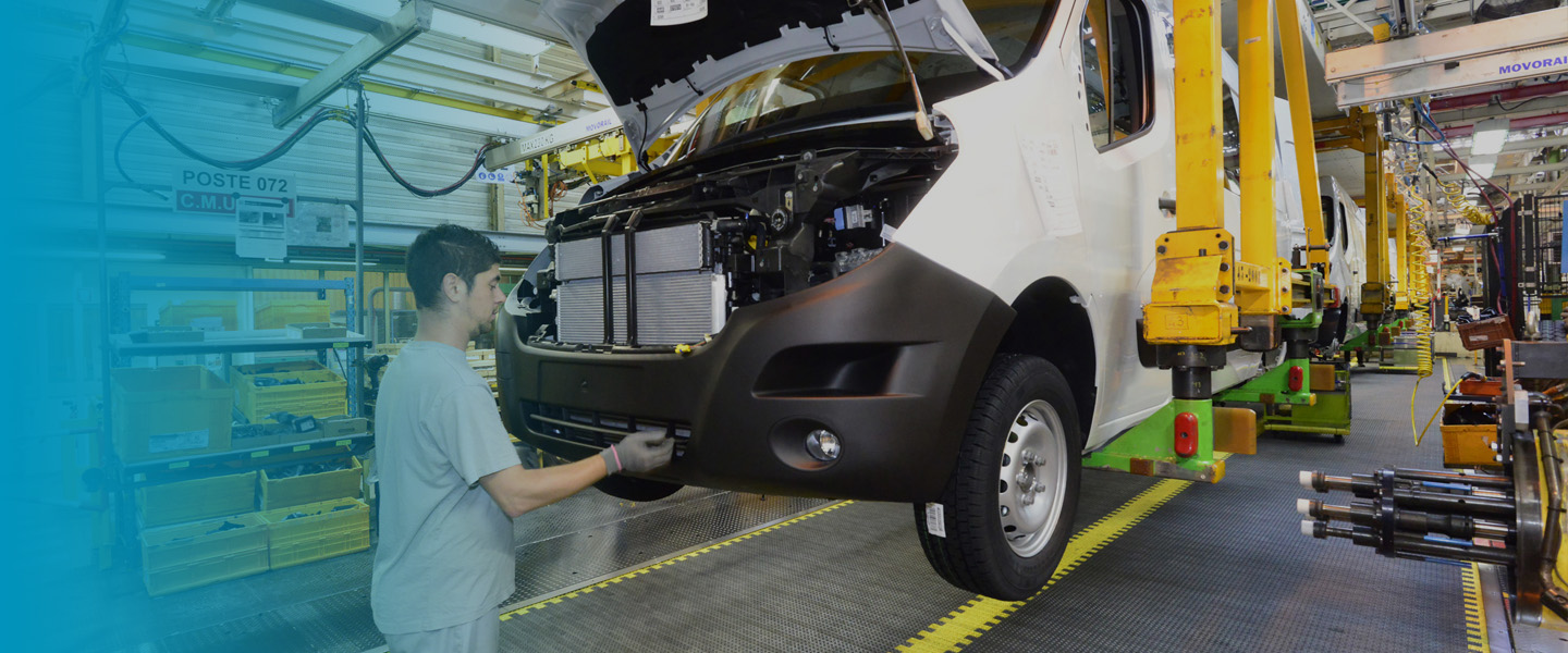 Photo of technician on automobile production line